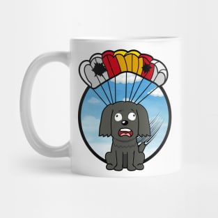 Silly black dog has a broken parachute Mug